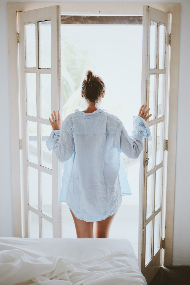 Woman in Morning Bedroom